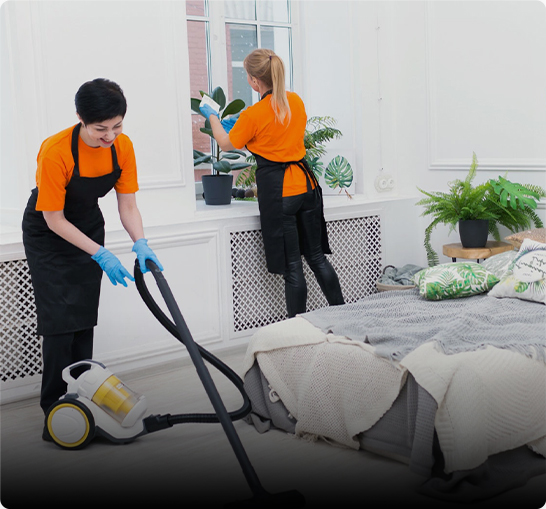 Cleaning staff preparing a vacation rental property for new guests, ensuring a clean and welcoming environment.