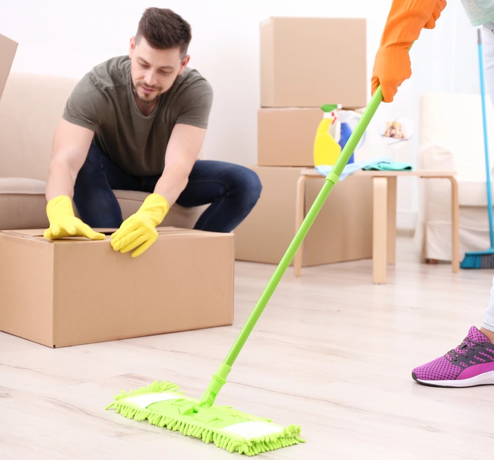 Cleaning service personnel preparing a residence for move-in or move-out, ensuring a fresh and tidy environment.